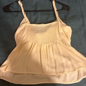 yellow little tank with a bow